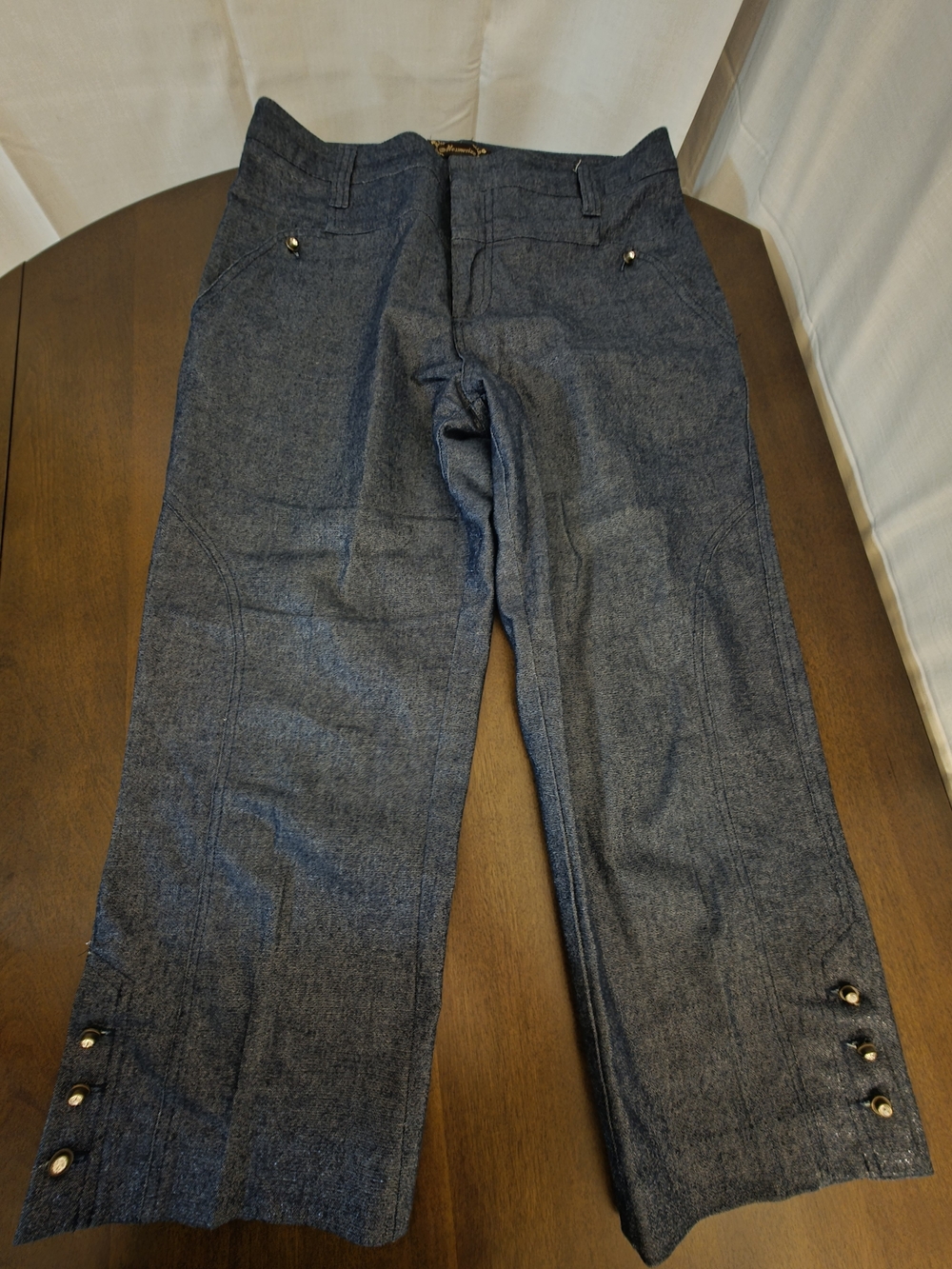 Dark Metalic Shimmer Denim Wide Leg Crop Pants with Rhinestone Buttons Accents.